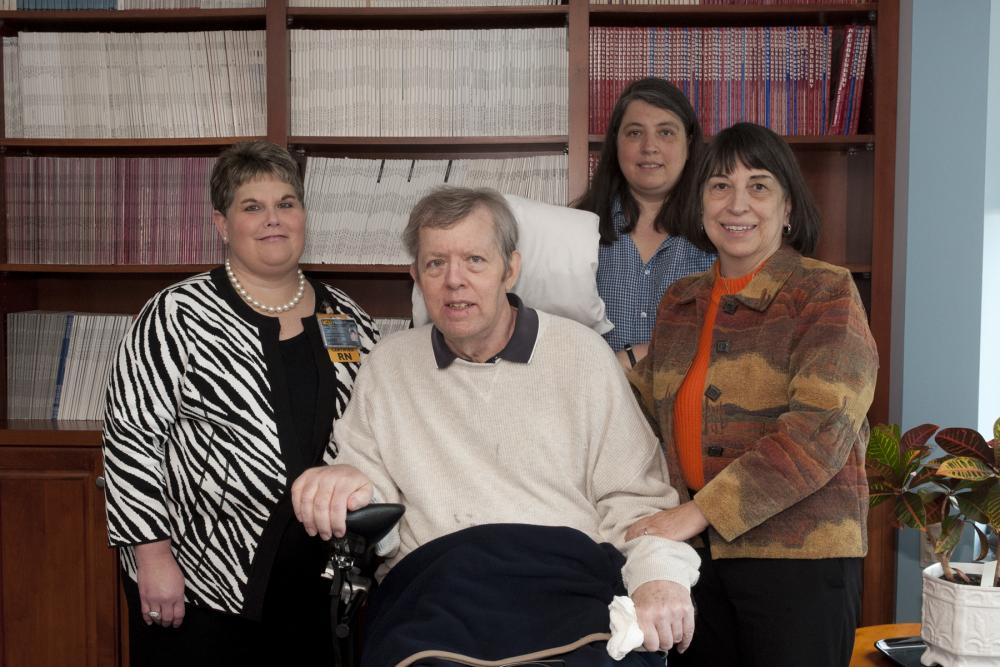 In 2013, Denise Lynch, RN, Dan Schmidt, Jess Schmidt and Sandy Schmidt celebrate the Schmidt family’s pledge to establish a service award for VCU Health employees in honor of Denise and the care she coordinated for Dan. VCU Health nurse Tanya Scott received the award in 2020. Photo: VCU University Marketing