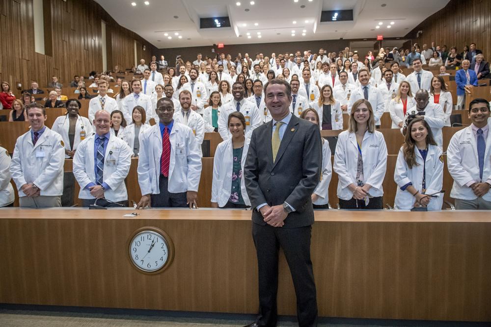 Gov. Ralph Northam poses with students from across the MCV Campus after discussing the opioid crisis with them on August 20.