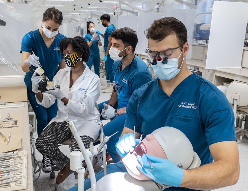 School of Dentistry students practice in the lab