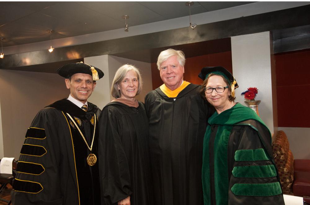 Ginny and Charles Crone (center) prepare for VCU’s commencement on May 12 with Michael Rao, Ph.D., president of VCU and VCU Health System, and Marsha Rappley, M.D., CEO of VCU Health System and vice president of health sciences at VCU.