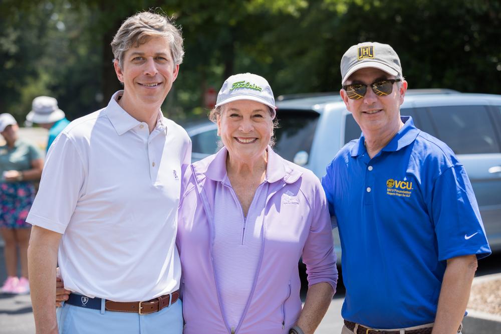 Landon Harper, Judy Brown and Brian Thomas prepare to hit the links at the fourth annual Harper’s Hope Golf Tournament and Auction on June 8.