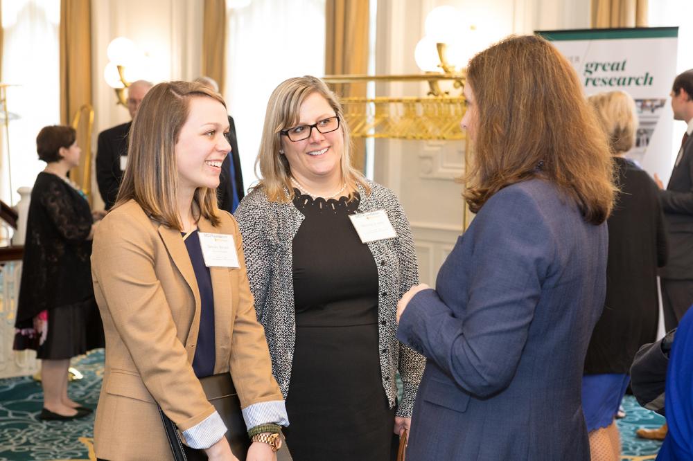 Brooke Brown, who spoke at the Endowed Scholarship Brunch, and her mother Michelle visit with MCV Foundation president Margaret Ann Bollmeier. 