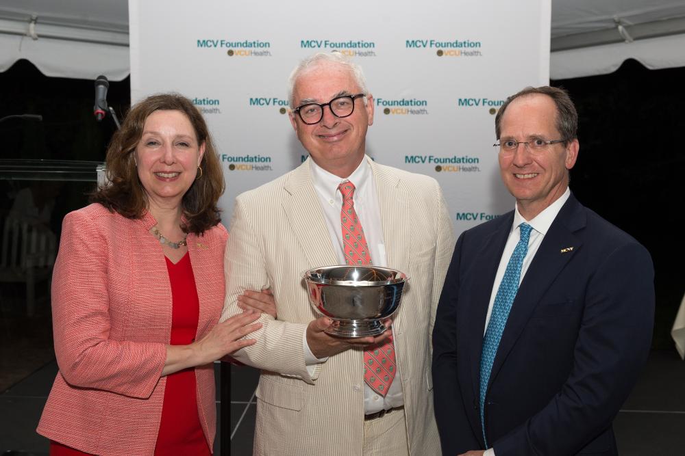 Peter Buckley, M.D., with Margaret Ann Bollmeier, president and CEO of the MCV Foundation, and Wyatt Beazley IV, the foundation's board chair.