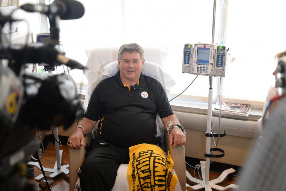 Jerry Creehan talks with reporters on Aug. 23 as he receives the first new FDA-approved ALS medication in more than 20 years. Jerry and two other patietns at VCU Health were the first in Virginia to receive the new treatment. Photo: VCU Public Affairs