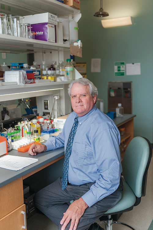 Alpha A. “Berry” Fowler III, M.D., professor of medicine in the Division of Pulmonary Disease and Critical Care Medicine at the VCU School of Medicine Department of Internal Medicine, works on Vitamin C research in his lab in The Molecular Medicine Research Building on the MCV Campus. Photo: Tom Kojcsich, VCU University Marketing 