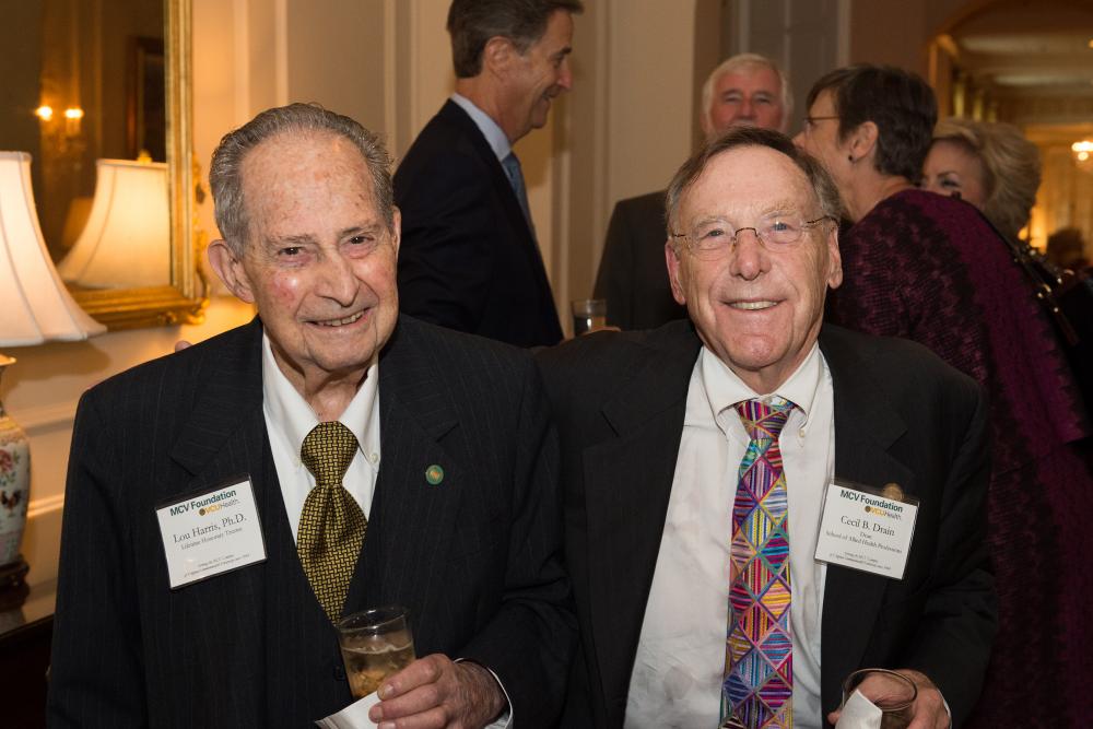 Dean Cecil Drain (right), Ph.D., who could not attend this year’s dinner, spends time with Lou Harris, Ph.D, at our 2017 dinner and awards ceremony.