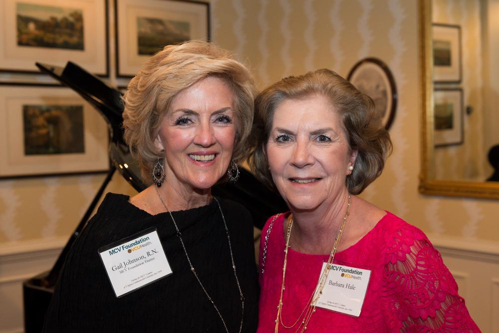 Gail Johnson, RN (left), who could not make it to this year’s dinner and awards ceremony, speaks with Barbara Hale at the 2017 dinner.