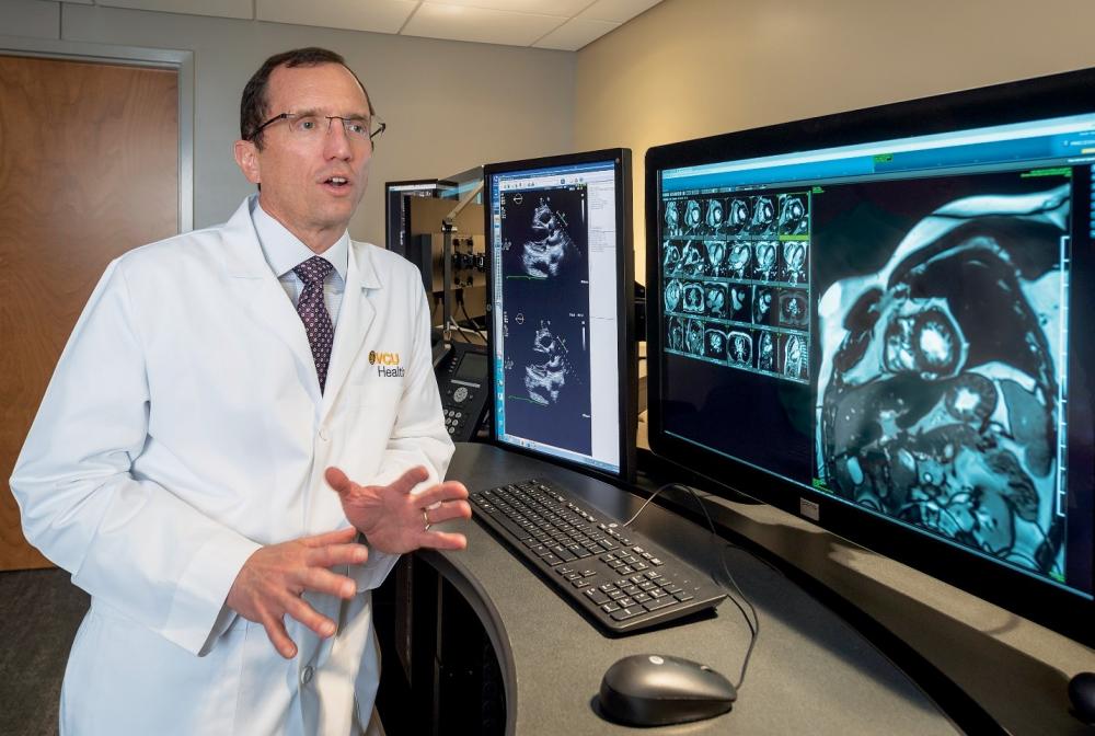 Greg Hundley, M.D., director of the Pauley Heart Center, discusses the advanced imaging capabilities of the MRI system in VCU Health’s Cardiac Imaging Suite, which supports personalized cardiovascular evaluation, diagnosis and treatment for both Pauley Heart Center and Massey Cancer Center patients. Dr. Hundley, a Richmond native and VCU School of Medicine alumnus, is recognized for studying the impact of chemotherapy and radiation therapy on heart health and advancing treatment options for patients in need of cardiovascular and oncology care. Photo: Kevin Morley, VCU University Marketing
