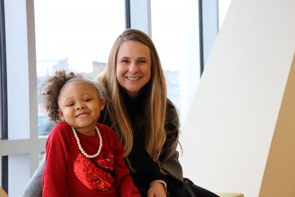 Jaylen Williams spends time with India Sisler, M.D., medical director of the comprehensive pediatric sickle cell disease program at CHoR. 