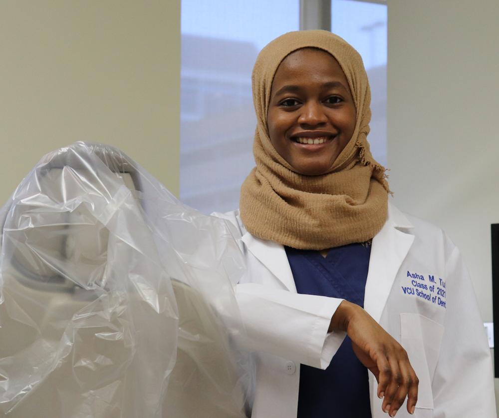 Asha Tuli is a fourth-year dental student who has benefitted from scholarships and hopes to improve access to dental care in rural areas after she graduates.