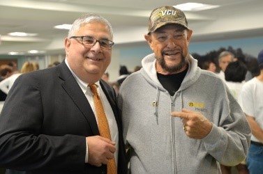 Elmer Lynn Jr. (right), celebrated his successful liver transplant with Dr. Marlon Levy (left) and Hume-Lee staff on June 27. Elmer’s transplant was the 5,000th performed at Hume-Lee.