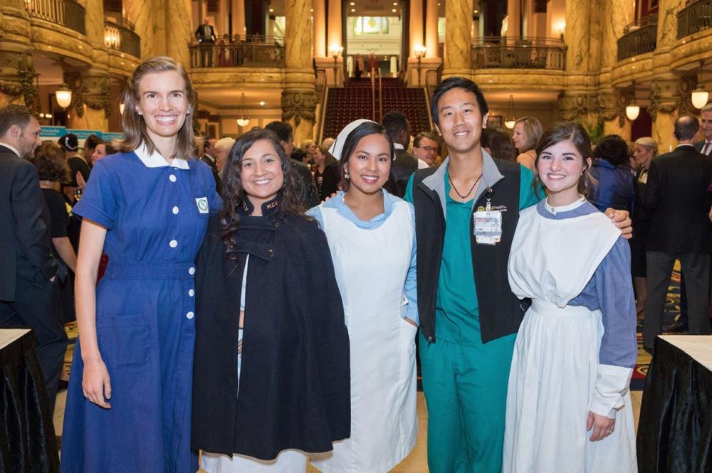 At the VCU School of Nursing’s 125th Anniversary Gala, students dress in nursing uniforms seen throughout the profession’s history. Pictured from left to right with era of uniform: Andrea Berger, 1950s; Shirley Barlow, 1940s; Jerica Santorum, 1980s; Jedidiah Fung, present-day; Stephanie Rudderow, 1890s. Photo courtesy of VCU School of Nursing