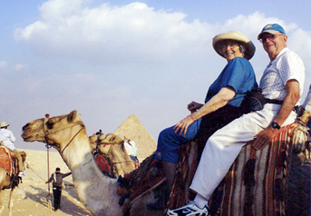 The Gouldins riding on a camel