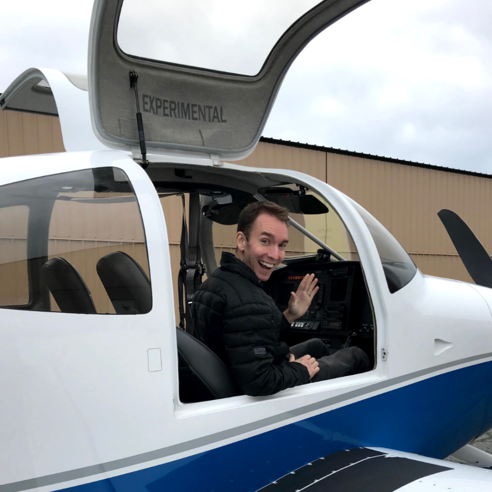 Geoff Shudtz waving from plane