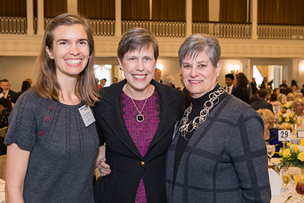 VCU School of Nursing student Andrea Berger (left) greets Jean Giddens, Ph.D. (center), dean of the School of Nursing, and Judy Collins, RN, WHNP, associate professor emeritus at the schools of Nursing and Medicine, at the 2019 MCV Campus Endowed Scholarship Brunch. Andrea holds a Lettie Pate Whitehead Foundation scholarship and is mentored by Judy.