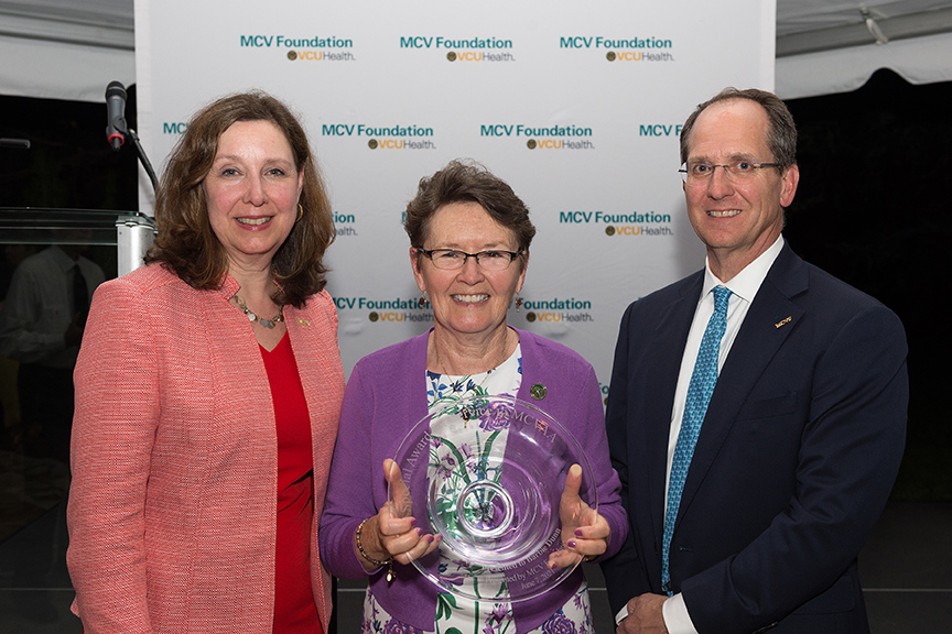 Barbie Dunn, Ph.D., with Margaret Ann Bollmeier, president and CEO of the MCV Foundation, and Wyatt Beazley IV, the foundation's board chair.