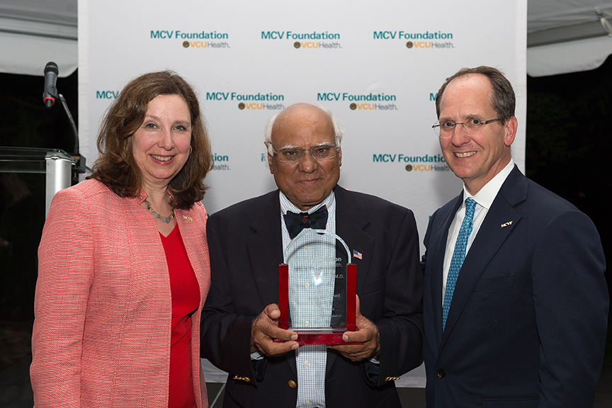 Ghulam Qureshi, M.D., with Margaret Ann Bollmeier, president and CEO of the MCV Foundation, and Wyatt Beazley IV, the foundation's board chair.