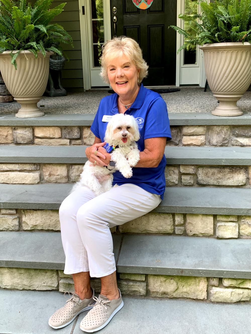 Joan Nuttle and Stewie the Maltese