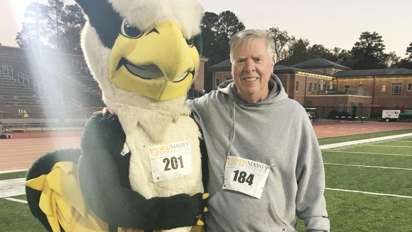 Charles Crone with the W&M mascot at the 2016 Massey Cancer Center 5K.