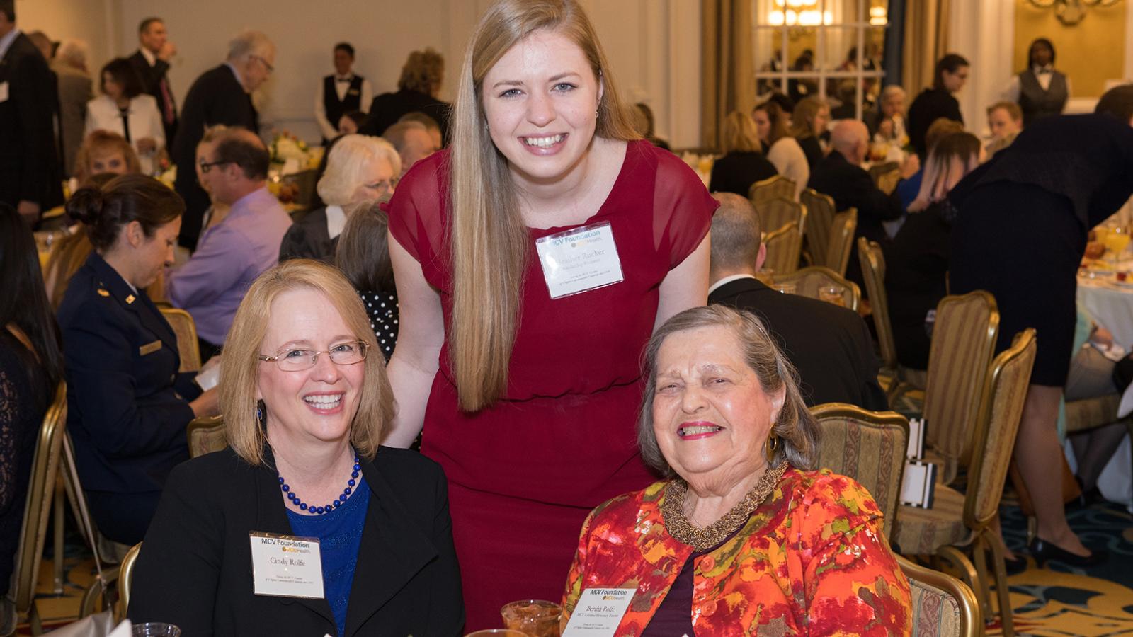 Students pose with donors.