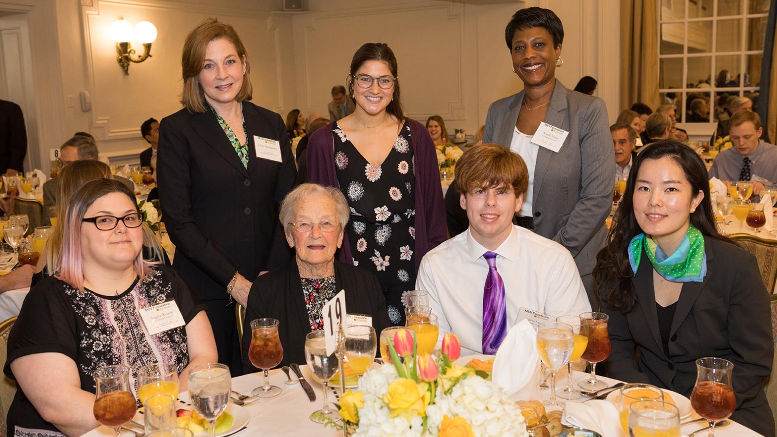 Students pose with donors.