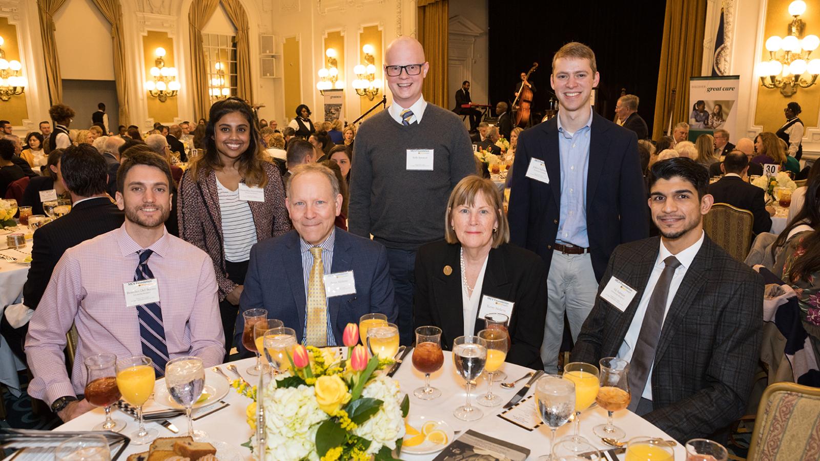 Students pose with donors.