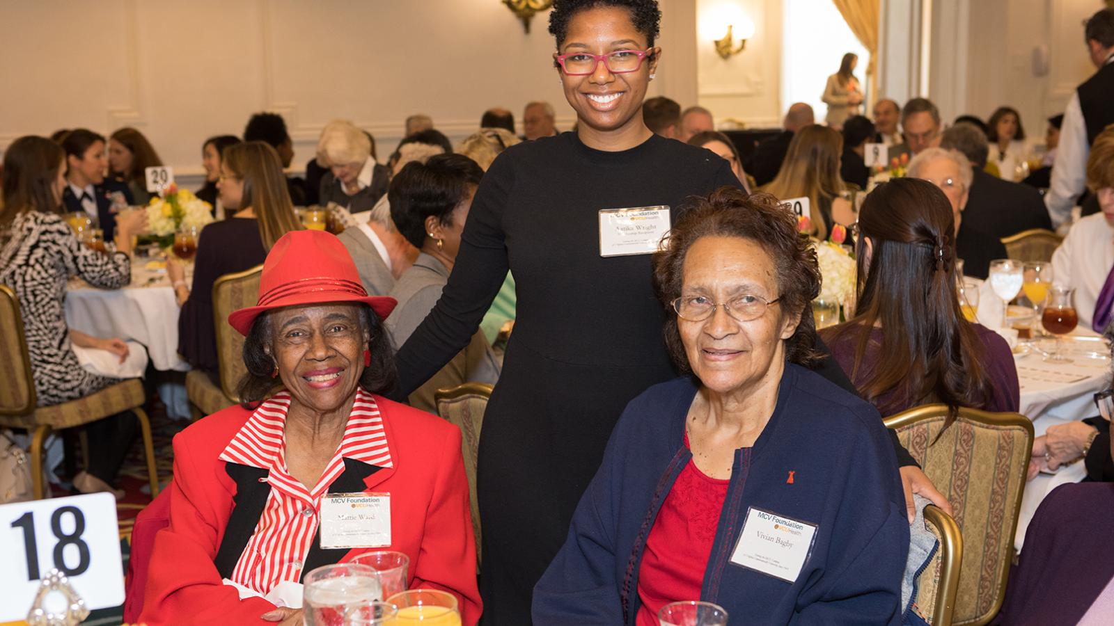 Students pose with donors.
