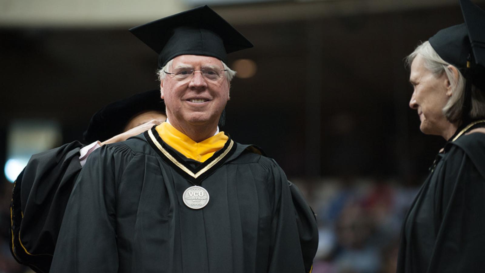 Charles Crone receives the Edward A. Wayne Medal at VCU's commencement on May 12.