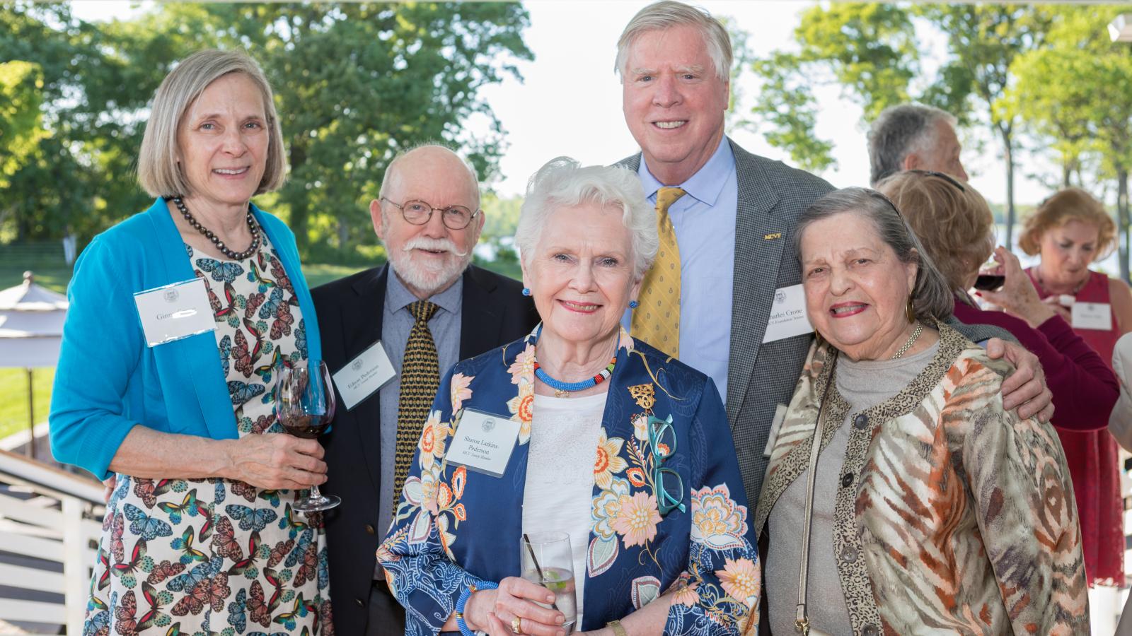 Ginny Crone, Edson Pederson, Sharon Larkins-Pederson, Charles Crone and Bertha Rolfe share a moment at our MCV Society event in May.