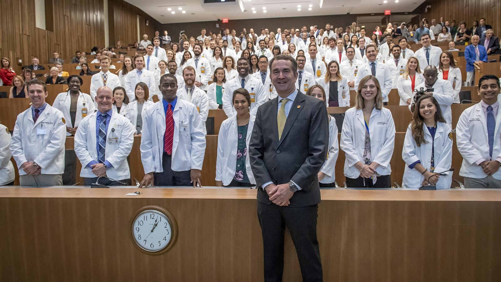 Gov. Ralph Northam poses with students from across the MCV Campus after discussing the opioid crisis with them on August 20.