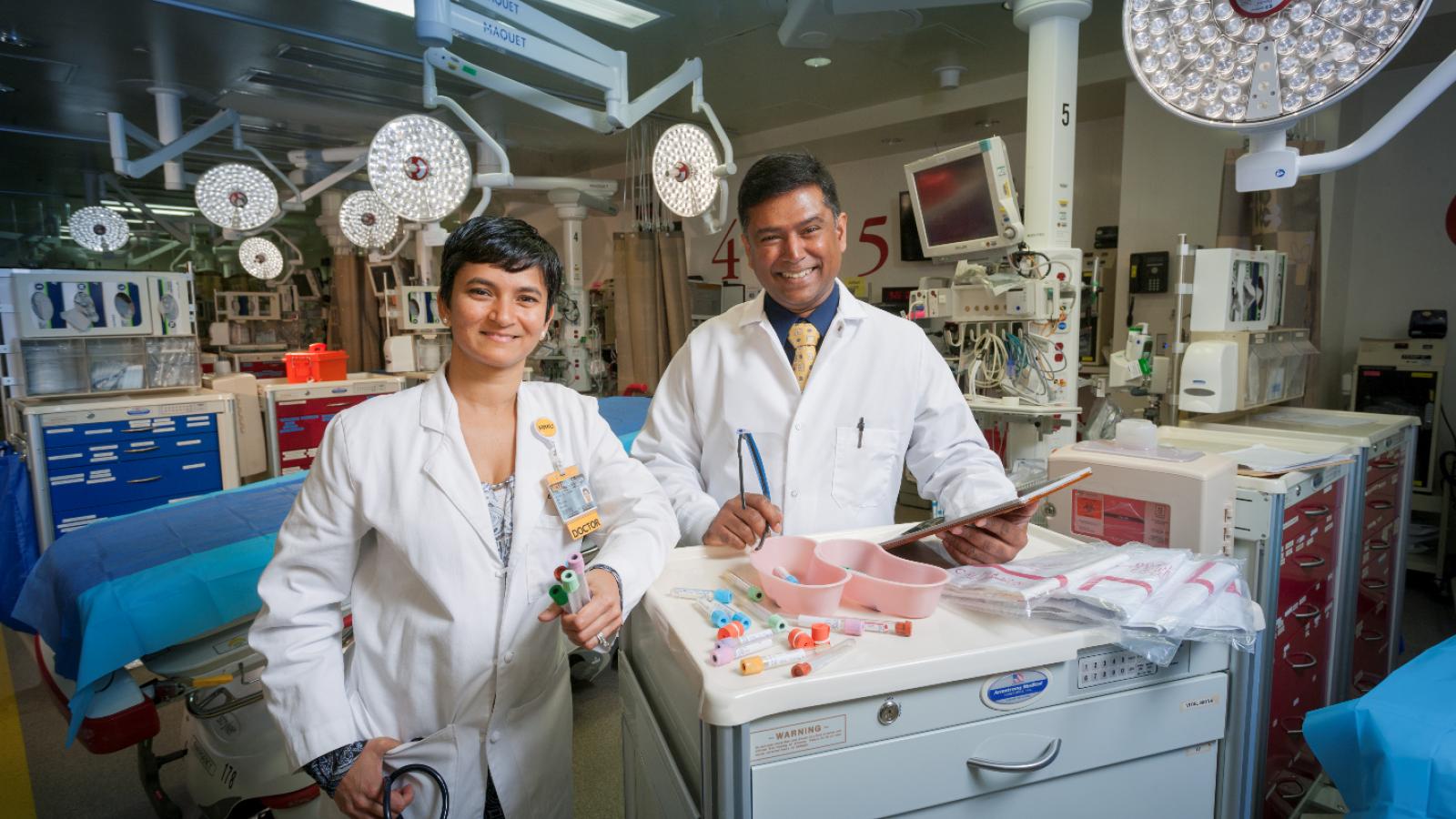 VCU Health trauma surgeon Sudha Jayaraman, M.D., and VCU School of Pharmacy assistant professor Dayanjan “Shanaka” Wijesinghe, Ph.D., collaborate on using mass spectrometry as a new method of analyzing what medications are in a patient’s blood. Photo: Karl Steinbrenner