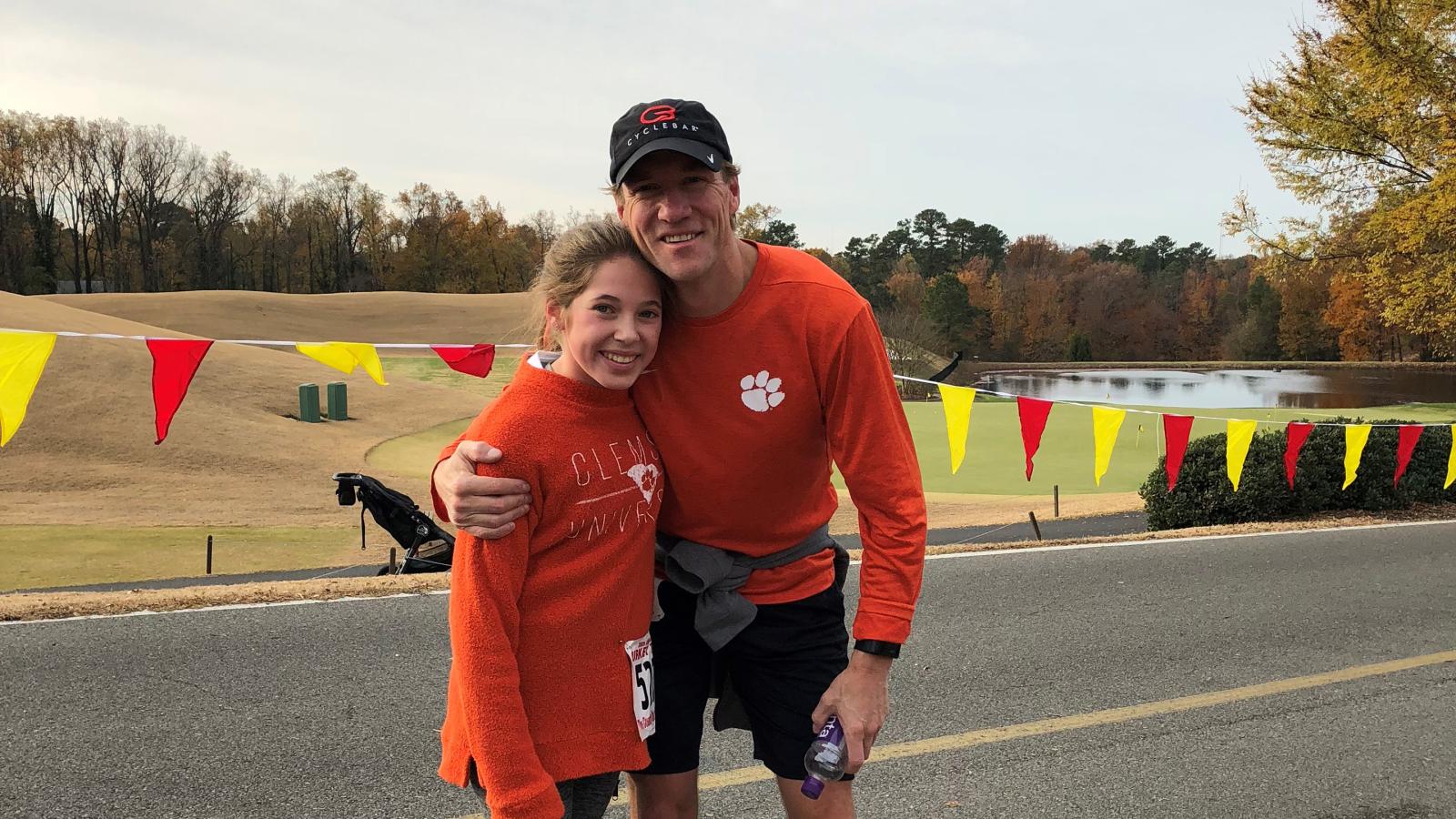 After finally receive the right diagnosis and treatment for Lyme disease, Craig Suro and his daughter are back to enjoying healthy, full lives. Running is one of their favorite activities, and here they celebrate completing a local turkey trot race together last Thanksgiving. Photo courtesy of the Suro family