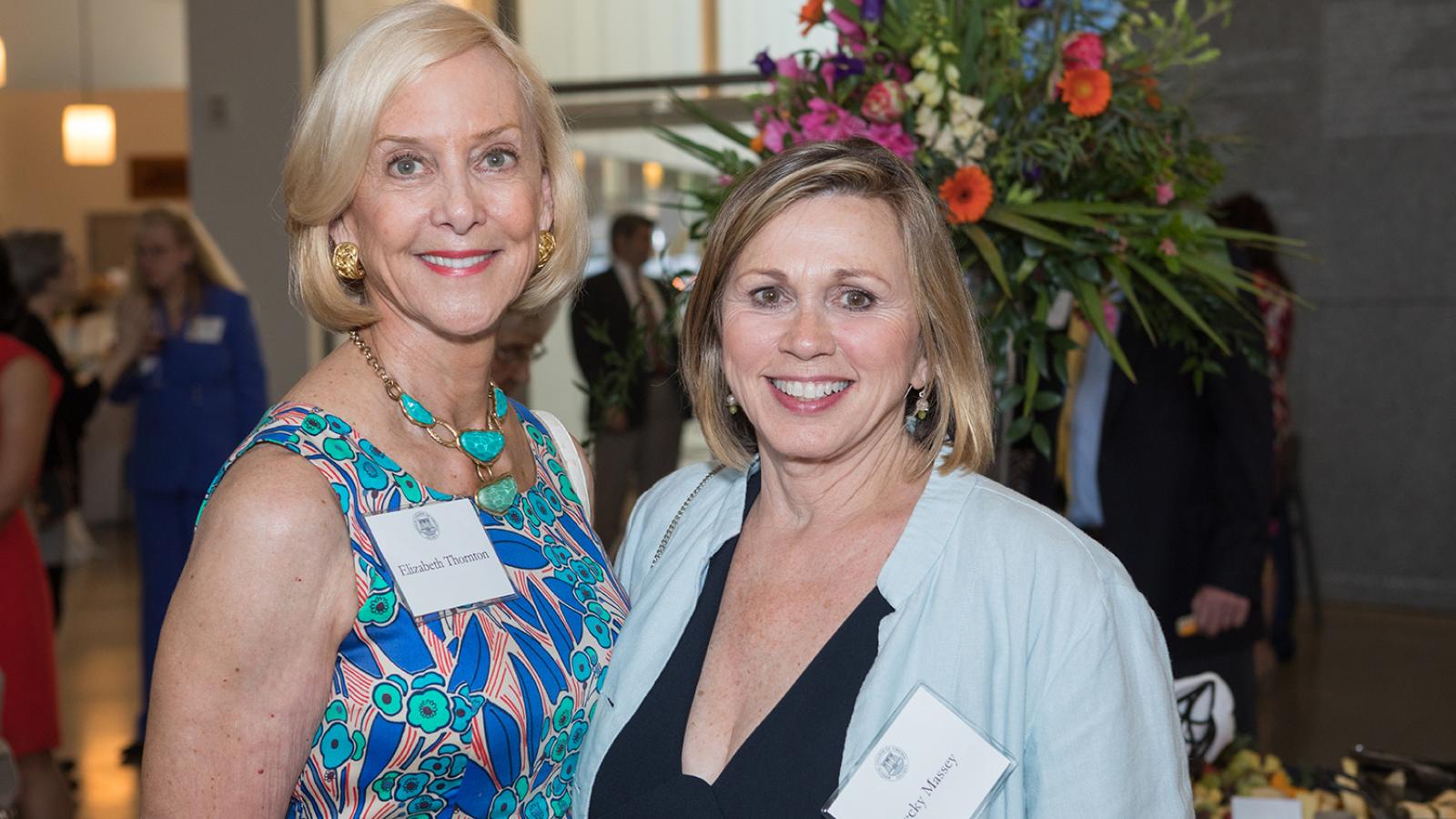 Beth Thornton talks with fellow MCV Society member Becky Massey at the 2019 MCV Society reception. 