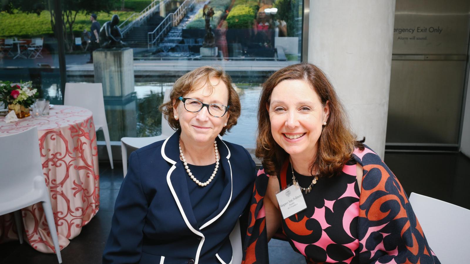 Marsha Rappley, M.D., former CEO of VCU Health System and senior vice president for health sciences at VCU, and Margaret Ann Bollmeier, president of the MCV Foundation, celebrate planned giving donors at the 2017 MCV Society reception. Photo: Brittany Daniel Studio