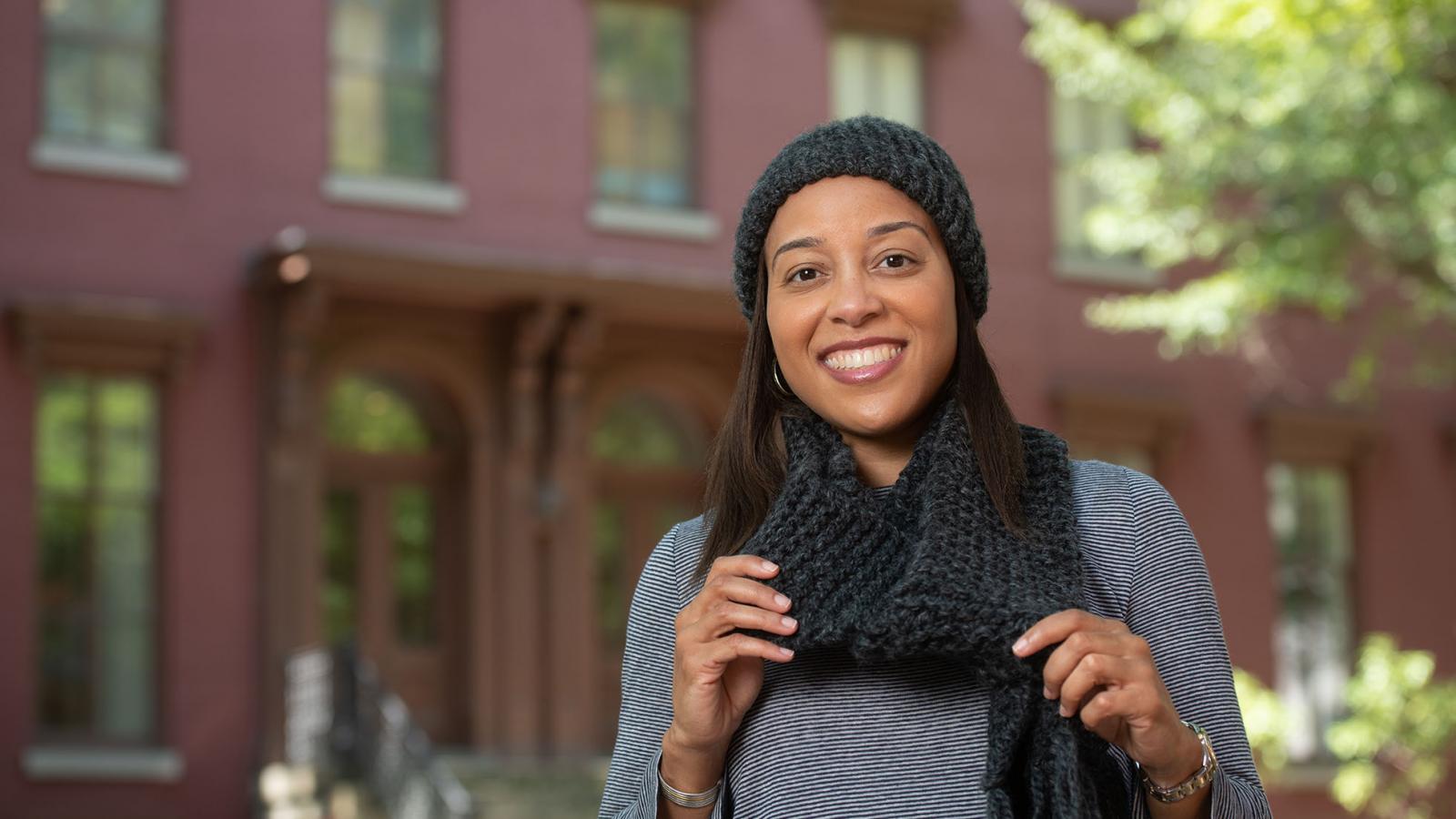 Dr. Denée Moore provides prenatal care and enjoys knitting hats and scarves as welcome gifts for her newborn patients. Photo: Allen Jones, VCU University Relations