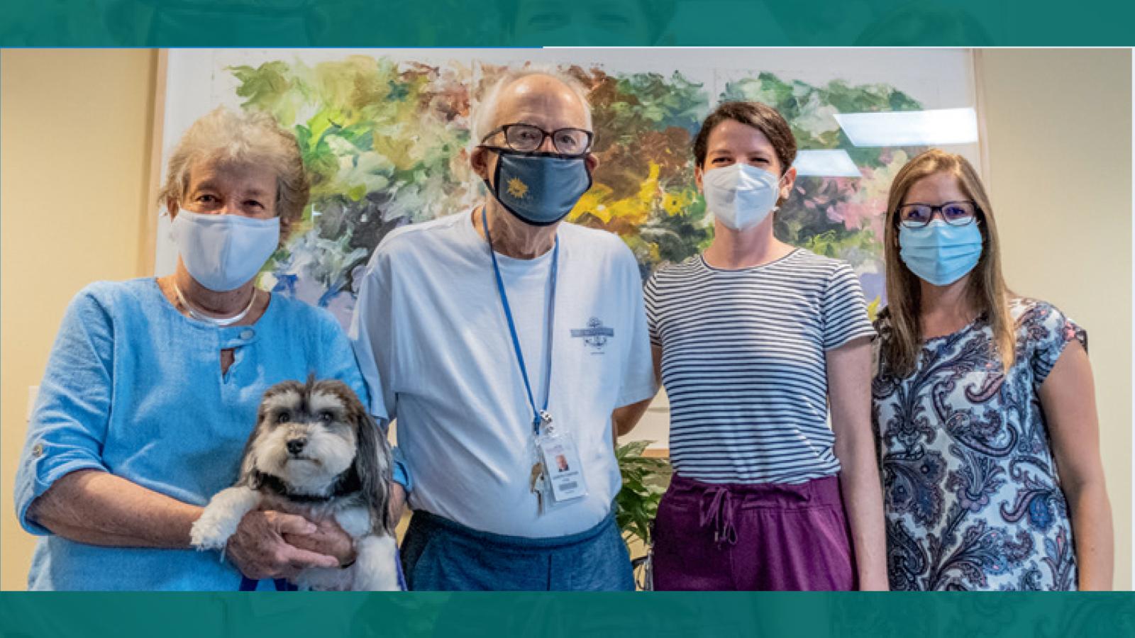 arol and Carter Fox (left, with their dog Joe), are  pictured with Tessa Shuck, physical therapist, and   Katie McGinn, speech therapist, who are assisting  Carter with his ongoing recovery from COVID-19 at Westminster Canterbury Richmond. Photo: Bob Coles