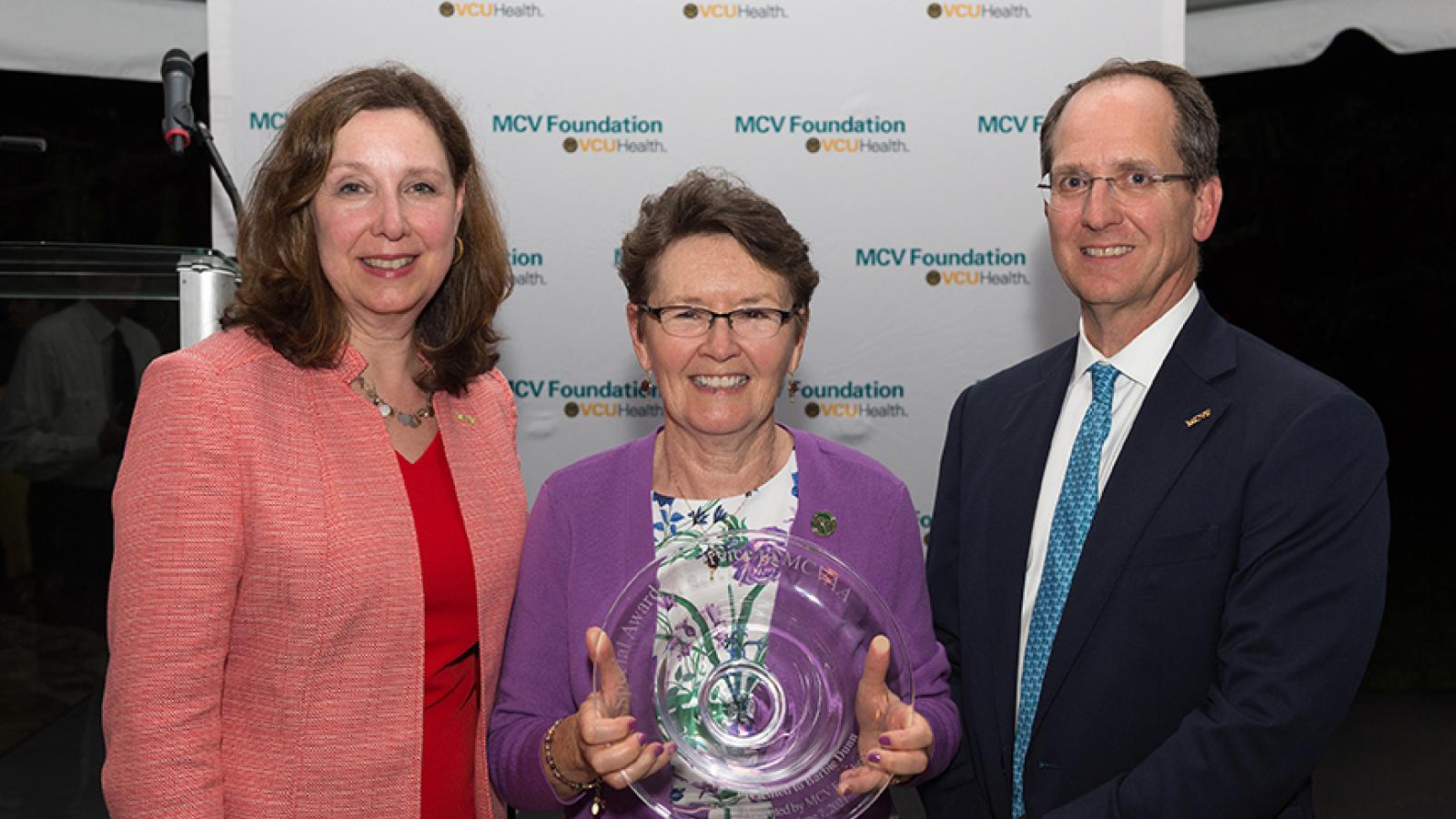 with Margaret Ann Bollmeier, president and CEO of the MCV Foundation, and Wyatt Beazley IV, the foundation's board chair.