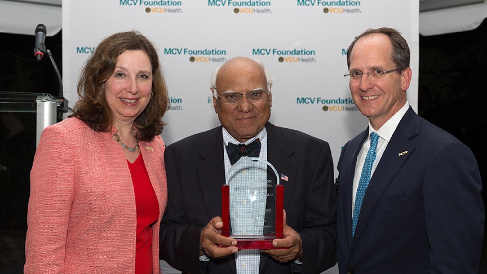 Ghulam Qureshi, M.D., with Margaret Ann Bollmeier, president and CEO of the MCV Foundation, and Wyatt Beazley IV, the foundation's board chair.