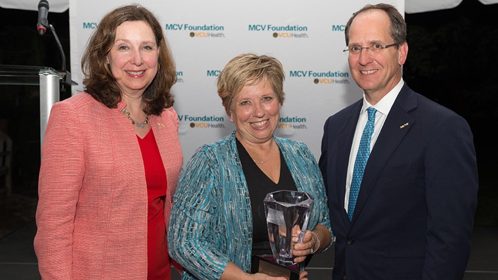 Pam Parsons, RN, Ph.D., with Margaret Ann Bollmeier, president and CEO of the MCV Foundation, and Wyatt Beazley IV, the foundation's board chair.